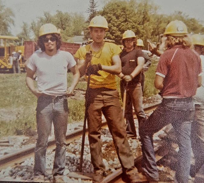 Braulio Sotelo, left, with his team members early in his railroading career Braulio Sotelo, left, with his team members early in his railroading career