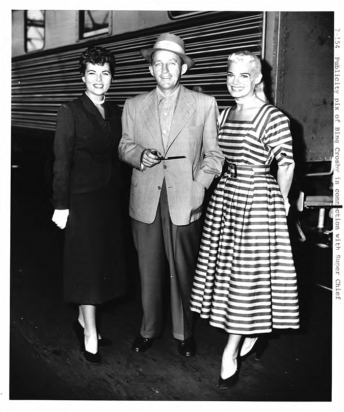 Bing Crosby, center, in front of the Super Chief Bing Crosby, center, in front of the Super Chief