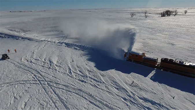 BNSF rotary snowplow in action